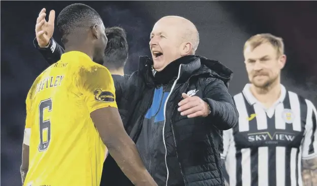  ??  ?? 0 Livingston boss David Martindale embraces Marvin Bartley after the Almondvale side’s 1-0 Betfred Cup semi-final victory over St Mirren yesterday