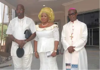  ??  ?? L-R Chukwuka, wife, Oby, with Archbishop Valerian Okeke