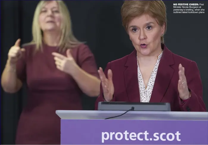  ??  ?? NO FESTIVE CHEER: First Minister Nicola Sturgeon at yesterday’s briefing, when she outlined latest lockdown plans