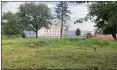  ?? PHOTO COURTESY OF TOWAMENCIN TOWNSHIP ?? Grave markers are seen in a cemetery located just south of the Holiday Inn hotel, in background, off of Sumneytown Pike in Towamencin.