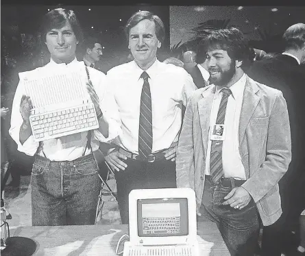  ??  ?? Steve Jobs, left, and Steve Wozniak, right (with John Sculley), co-founded Apple. RICK BROWNE/PICTURE GROUP