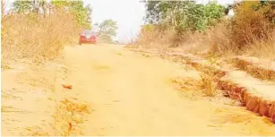  ?? ?? A car plying poor Rimba-Ebagi road in Abaji