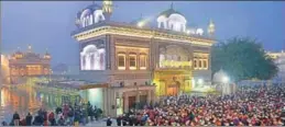  ?? HT FILE ?? Thousands of devotees thronged the Golden Temple to obeisance on the first day of the New Year in Amritsar.
