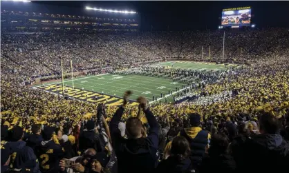  ??  ?? Michigan’s football program is worth tens of millions of dollars. Photograph: Tony Ding/AP