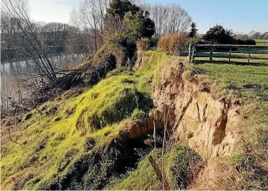  ??  ?? Families of Huramua Marae in Wairoa are raising funds to exhume and shift the remains of 53 relatives buried in Ma¯titi Cemetery, which is being eroded by the Wairoa River.