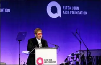  ?? PHOTO BY ANDY KROPA — INVISION — AP ?? Elton John speaks at the Elton John AIDS Foundation’s 17th annual “An Enduring Vision” benefit gala at Cipriani 42nd Street on Monday in New York.