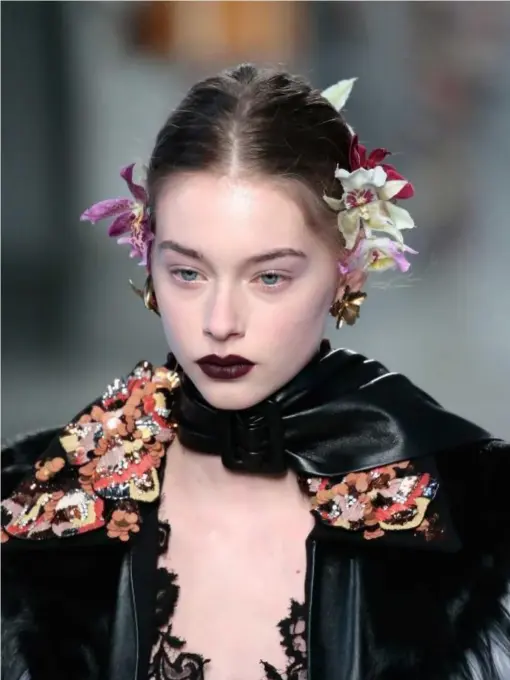  ?? (Getty) ?? The matte trend persists, with this no-shine shade of merlot in the Rodarte Autumn Winter 2016 show