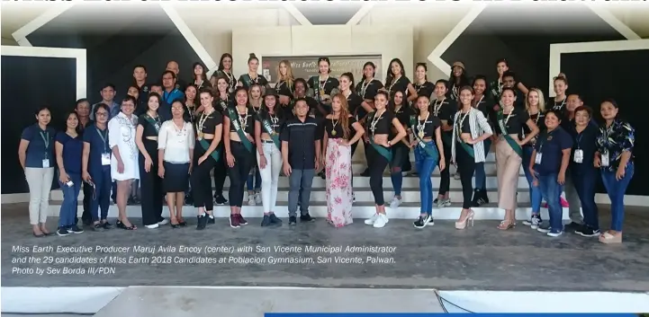  ?? Photo by Sev Borda III/PDN ?? Miss Earth Executive Producer Maruj Avila Encoy (center) with San Vicente Municipal Administra­tor and the 29 candidates of Miss Earth 2018 Candidates at Poblacion Gymnasium, San Vicente, Palwan.