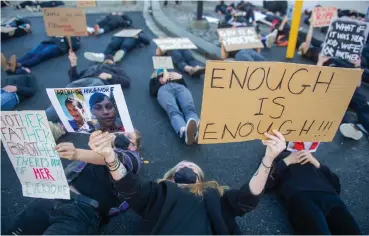  ?? African News Agency (ANA) ?? ACTIVISTS against gender-based violence demonstrat­ed outside Parliament yesterday, calling for the government to put an end to the killing of women, children and members of the LGBTQ+ community. See page 3 | COURTNEY AFRICA