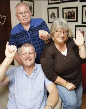  ??  ?? Edward Power from Kilmacanog­ue and James and Niamh Doyle from Aughrim, who are part of the committee of Wicklow Deaf Society, which is promoting Irish Sign Language Awareness Week, which runs until this Sunday, September 24.