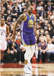  ?? Carlos Avila Gonzalez / The Chronicle ?? Iguodala limps off the court after making a shot near the end of Game 1 of the NBA Finals in May.