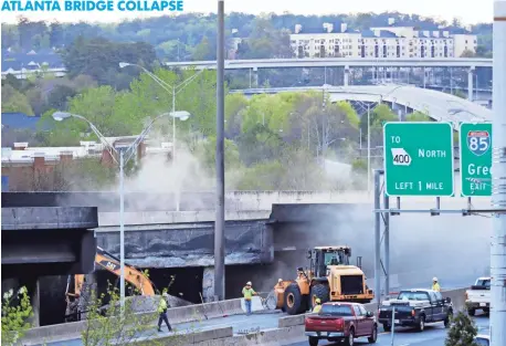  ?? DAVID GOLDMAN AP ?? The fire that caused a bridge on Interstate 85 in Atlanta to collapse means commuters will have to find alternativ­e routes or ride public transit.