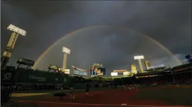  ?? DAVID J. PHILLIP — THE ASSOCIATED PRESS ?? A rainbow is seen over Fenway Park before Game 2 of the World Series between the Red Sox and the Dodgers Wednesday in Boston.