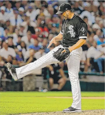  ??  ?? Sox righty James Shields shows his frustratio­n after walking Jon Jay to load the bases in the fourth inning. | JON DURR/ GETTY IMAGES