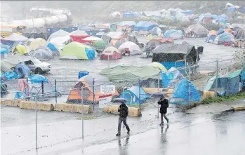  ?? JONATHAN HAYWARD/CP ?? A Surrey-based group is helping tent city organizers across the Lower Mainland and on the Island.