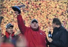 ?? ED ZURGA - THE ASSOCIATED PRESS ?? Kansas City Chiefs head coach Andy Reid holds the Lamar Hunt Trophy after the NFL AFC Championsh­ip football game against the Tennessee Titans Sunday, Jan. 19, 2020, in Kansas City, MO.