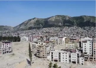  ?? ?? A general view of destroyed or severally damaged buildings after a powerful earthquake in Antakya, southeaste­rn Turkey, Wednesday, May 10, 2023. AP Photo