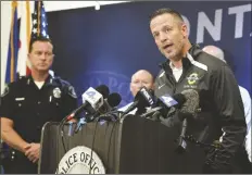  ?? WILL LESTER/AP ?? ONTARIO CHRISTIAN HIGH SCHOOL PRINCIPAL BENJAMIN DYKHOUSE addresses the media during a press conference as Ontario Police Chief Michael Lorenz (left) looks on, following the arrest of Ontario Christian High School senior Sebastian Villasenor in Ontario, Calif., on Wednesday.