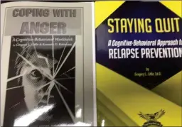  ?? PHOTO PROVIDED ?? Two new workbooks were purchased with the Department of Correction­s (DOC) grant through Marshall County Community Correction­s for additional curriculum being incorporat­ed into the Jail Chemical Addictions Program: “Coping with Anger” and “Staying Quit: A Cognitive-behavioral Approach to Relapse Prevention”.