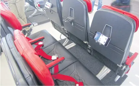  ??  ?? New, slim seats with device friendly features may be the next big thing at AirAsia.