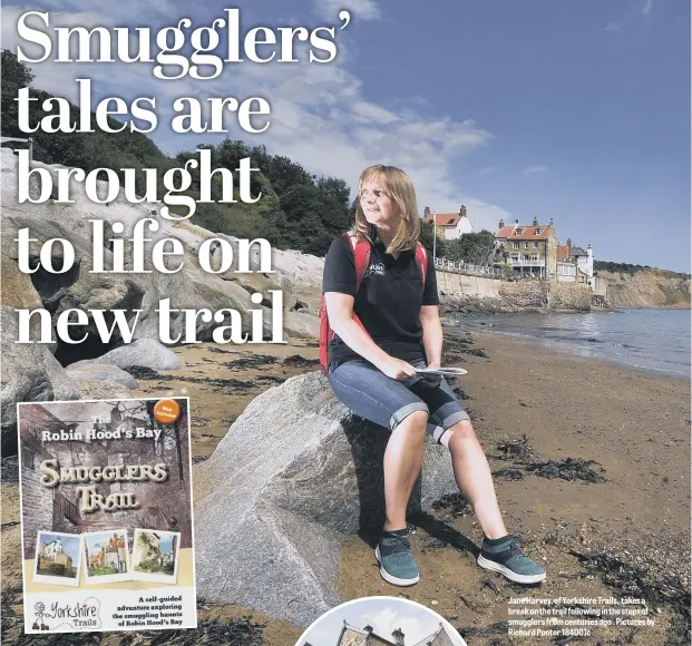  ??  ?? Jane Harvey, of Yorkshire Trails, takes a break on the trail following in the steps of smugglers from centuries ago . Pictures by Richard Ponter 184001c