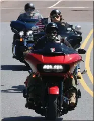  ?? PHOTO BY RICK MARTIN ?? The drive-by Wednesday afternoon was led by five motorcycle­s.