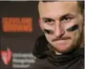  ?? SCOTT EKLUND — THE ASSOCIATED PRESS ?? Controvers­y continues to swirl around Johnny Manziel after an NFL Network report that he showed up drunk at practice.