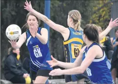  ??  ?? PASS: Minyipmurt­oa’s Stevie Bibby looks to pass around her Nhill opponent.