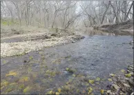  ?? Flip Puttoff/NWA Democrat-Gazette ?? Flint Creek flows clear and picturesqu­e March 1 through Flint Creek Headwaters Preserve on the edge of Springtown in west Benton County. The preserve is open to the public and offers hiking, bird watching and related nature activities.