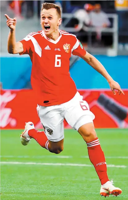  ??  ?? La imagen: Denis Cheryshev, feliz por sus dos primeros goles ante Arabia