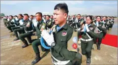  ?? HENG CHIVOAN ?? Cambodian peacekeepe­rs kneel in formation during a send-off ceremony in Phnom Penh on Thursday.