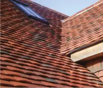  ?? ?? Handmade clay roof tiles like these by Lifestiles, above, can be protected from moss and algae using a range of tried and tested measures.