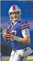  ?? AP FILE PHOTO/BRETT CARLSEN ?? Buffalo Bills quarterbac­k Josh Allen, pictured, will match up with another young standout today as his team takes on the Baltimore Ravens and Lamar Jackson.