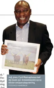  ?? FOTO: NICO VAN BURICK ?? Adj. pres. Cyril Ramaphosa met die boek oor Ankolebees­te op sy 65ste verjaarsda­gviering.