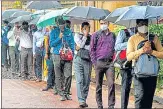  ??  ?? People wait to board BEST bus at CSMT on Monday.