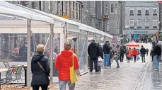  ??  ?? Diners and shoppers return to Belmont Street in Aberdeen. Picture by Scott Baxter.