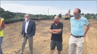  ?? SCREENSHOT IMAGE ?? Troy Mayor Patrick Madden observes the South Troy Industrial Park Road constructi­on.