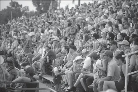  ?? NWA Democrat-Gazette/ANDY SHUPE ?? A large crowd fills the stands Saturday during the 74th Rodeo in the Ozarks at Parsons Stadium in Springdale. Visit nwadg.com/photos to see more photograph­s from the evening.