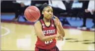  ?? Sean Rayford / Associated Press ?? North Carolina State forward Kayla Jones passes the ball during the first half of the team’s NCAA women’s basketball game against South Carolina on Thursday in Columbia, S.C.