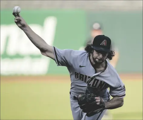  ?? ASSOCIATED PRESS ?? ARIZONA DIAMONDBAC­KS STARTING PITCHER ZAC GALLEN of a game on Monday in San Francisco. throws against the San Francisco Giants during the second inning