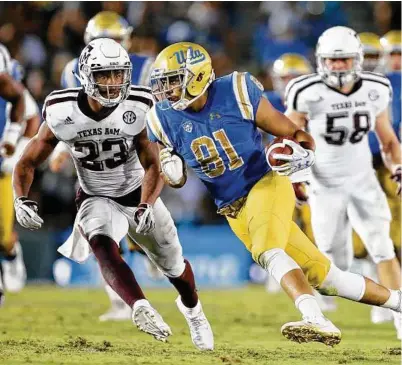  ?? Danny Moloshok / Associated Press ?? Texas A&M defenders such as Armani Watts (23) will be more than happy to forget UCLA and focus on Nicholls State.