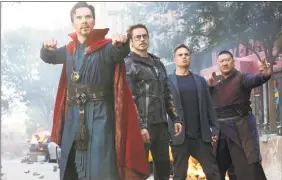  ??  ?? From left, Benedict Cumberbatc­h, Robert Downey Jr., Mark Ruffalo and Benedict Wong in a scene from “Avengers: Infinity War.”