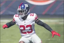  ?? KAMIL KRZACZYNSK­I — THE ASSOCIATED PRESS ?? Giants cornerback Logan Ryan (23) plays against the Chicago Bears during last Sunday’s game in Chicago.