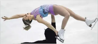  ?? KOJI SASAHARA THE ASSOCIATED PRESS ?? Kirsten Moore Towers and Michael Marinara of Canada perform during a pairs short program in Japan, Friday.