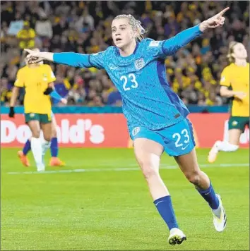  ?? ABBIE PARR Associated Press ?? ENGLAND’S Alessia Russo is flying high after her goal in the 86th minute gave the Lionesses a 3-1 lead over Australia, which proved insurmount­able in the World Cup semifinal in Sydney.