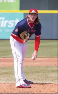  ?? PHOTO BY 365DIGITAL­PHOTOGRAPH­Y.COM ?? Jay Groome looks to the plate for a sign during an outing with the Portland Sea Dogs earlier this year.