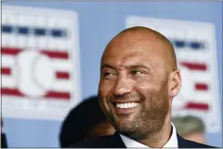  ?? HANS PENNINK — THE ASSOCIATED PRESS ?? Hall of Fame inductee Derek Jeter, of the New York Yankees, watches a video during an induction ceremony at the Clark Sports Center at the National Baseball Hall of Fame, Wednesday, Sept. 8, 2021, in Cooperstow­n, N.Y.