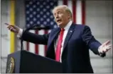  ?? CAROLYN KASTER — THE ASSOCIATED PRESS ?? President Donald Trump speaks at a campaign rally at Atlantic Aviation in Moon Township, Pa. Weeks after prodding lawmakers to stand up to the National Rifle Associatio­n,Trump is backing off his call for increasing the minimum age to buy an assault...