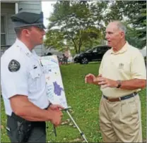  ?? FRAN MAYE – DIGITAL FIRST MEDIA ?? State Rep. Steve Barrar, R-160, right, talks with Kennett Township Police Chief Lydell Nolt during Kennett Square’s National Night Out Tuesday night.