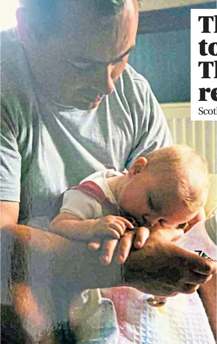  ??  ?? Cara Wilson as a baby in the arms of her dad Jim who died in May after catching Covid in the first wave